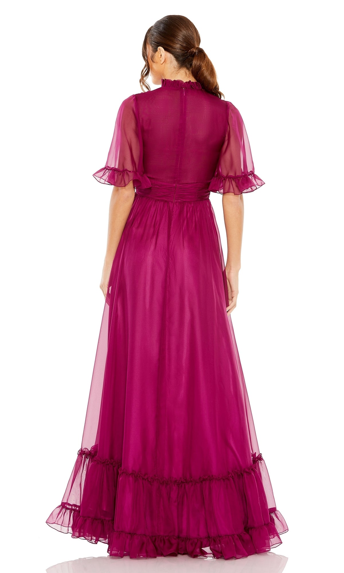 Woman shown from the back wearing the Mac Duggal 68229 short sleeve long formal dress in sheer magenta, featuring a floor-length design with ruffled hem and sleeves.